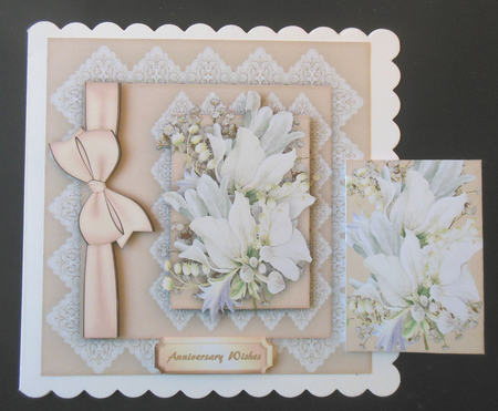 Beautiful Cream Anemomes on lace  by Hazel Sumner