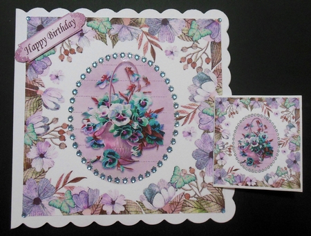 pretty pink pansies in a basket in floral frame with butterflies 8x8 by Hazel Sumner