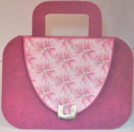 Pink handbag with floral flap and metal clasp mini kit by Hazel Underwood