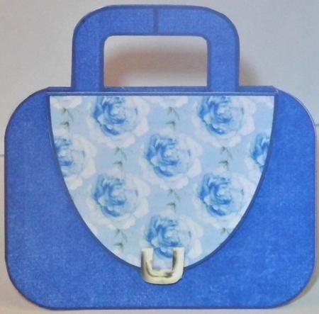 Blue handbag with floral flap and metal clasp mini kit by Hazel Underwood