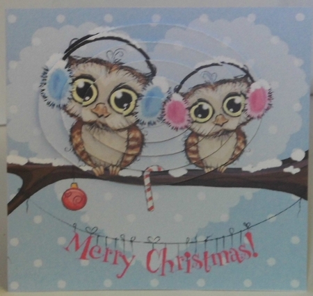 Cute owls on a branch wearing ear muffs oval pyramids by Hazel Underwood