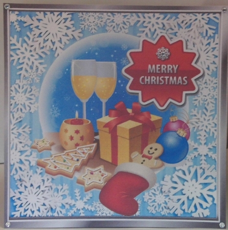 A lovely festive christmas with goodies in blue snowflake 8x8 frame by Hazel Underwood