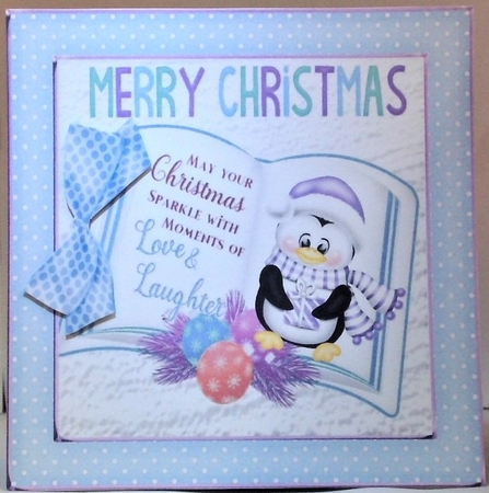 blue polkadot frame with open book and penguin 8x8 by Hazel Underwood