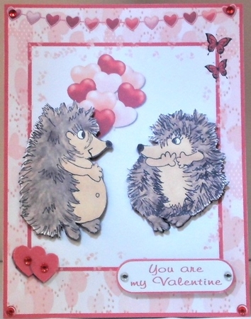 Happy Valentines day greeting card with cute hegdehogs by Hazel Underwood