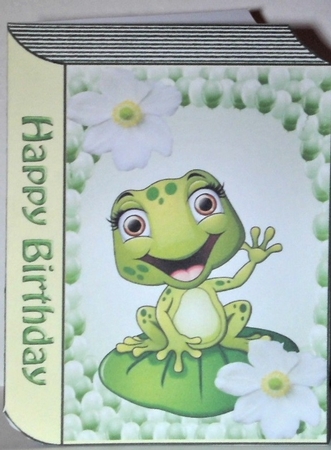 Cute little frog on a lily pad with white lilies in balloon frame folded book by Hazel Underwood