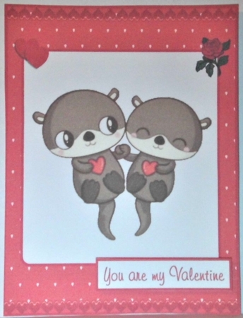 Valentines day greeting card with cute otters by Hazel Underwood
