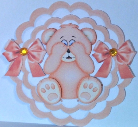Cute little peach baby bear with bows rocker card by Hazel Underwood