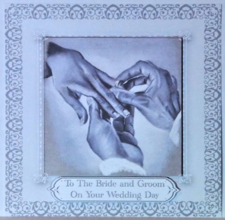 Wedding Couple Exchanging Rings by Hazel Underwood