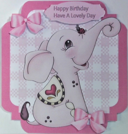 lovely little pink elephant with bows  on check 7x7 topper by Hazel Underwood