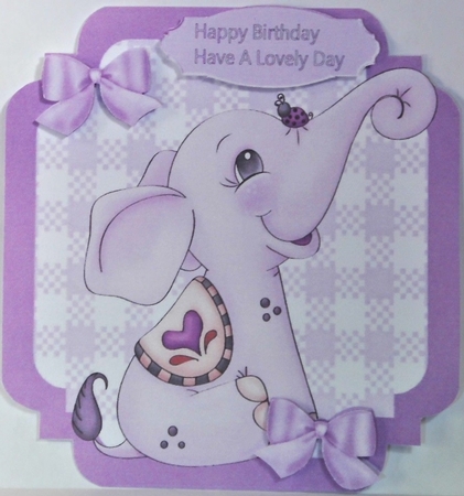 lovely little lilac elephant with bows  on check 7x7 topper by Hazel Underwood