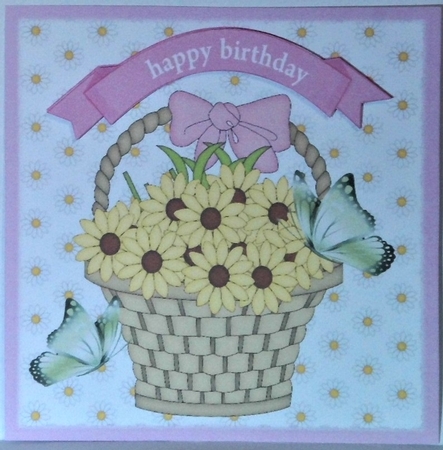 yellow daisies, with green butterflies in a basket 7x7 by Hazel Underwood