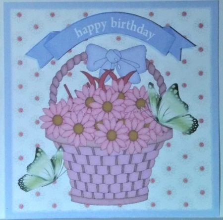 pink daisies, with green butterflies in a basket 7x7 by Hazel Underwood