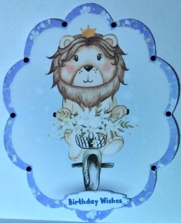 Lion On a Bike by Hazel Underwood