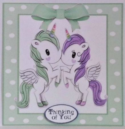 Cute unicorns in green/purple polkadot 7x7 frame by Hazel Underwood