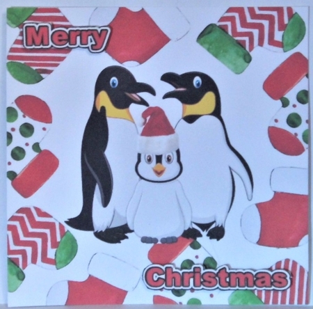 Cute penguin family in red  santa hat in christmas sock frames 7x7 by Hazel Underwood
