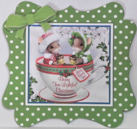 Cute christmas mice in a teacup, in green polkadot frame by Hazel Underwood