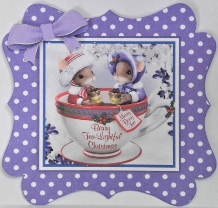 Cute christmas mice in a teacup, in purple polkadot frame by Hazel Underwood
