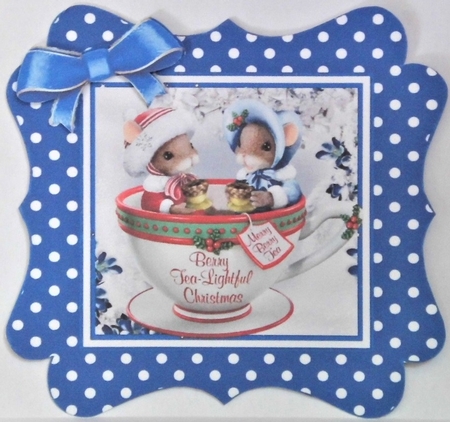 Cute christmas mice in a teacup, in royal blue polkadot frame by Hazel Underwood