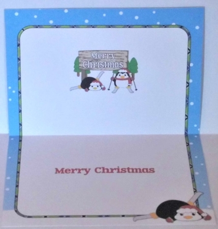 Christmas Fat Penguins Skiing with sign CHRISTMAS a5 insert by Hazel Underwood