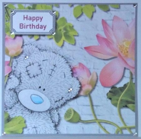 Tatty teddy with flowers by Hazel Underwood