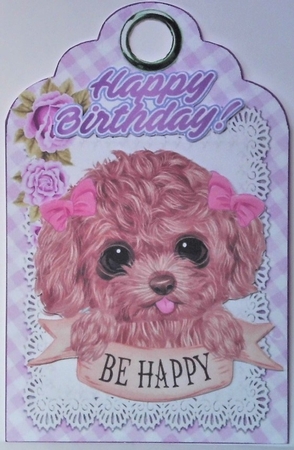 Sweet puppy with bows and lilac roses on a gingham tag by Hazel Underwood