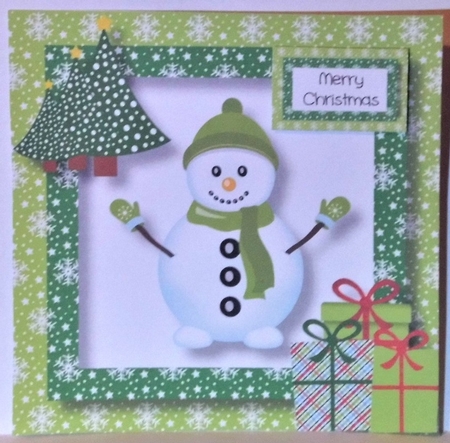 Christmas Snowman In Green by Hazel Underwood