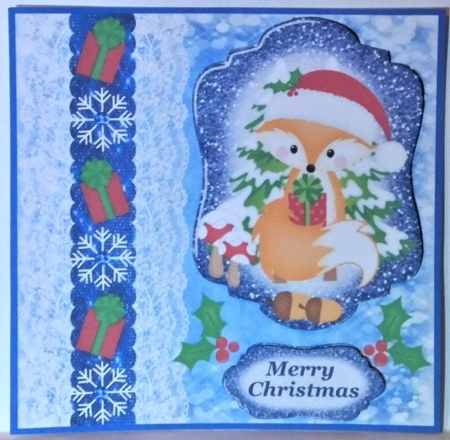 Blue Christmas present fox card front by Hazel Underwood