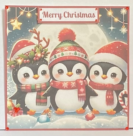 Cute Christmas Penguins Toppers. by Hazel Underwood