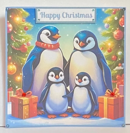 Cute Christmas Penguin Family Toppers. by Hazel Underwood