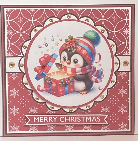 Penguin with present decoupage christmas card by Hazel Underwood
