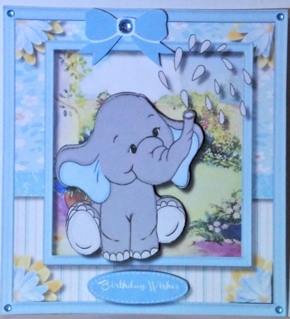 Blue Ellie Watering the Garden  by Hazel Underwood