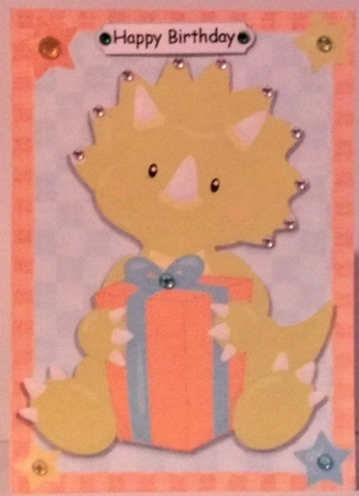 Dinosaur with Present by Hazel Underwood
