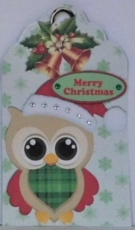 cute owl in santa hat on a snowflake tag with bells by Hazel Underwood