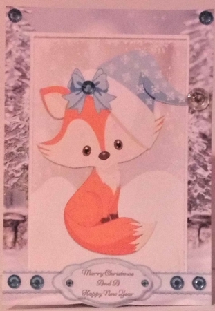 Cute Fox With Blue Santa Hat by Hazel Underwood