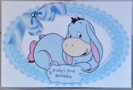 Cute little  Donkey with blue bow in gingham oval frame by Hazel Underwood