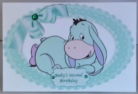 Cute little  Donkey with turq bow in gingham oval frame by Hazel Underwood