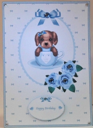 Blue A5 pup in a cup card front by Hazel Underwood