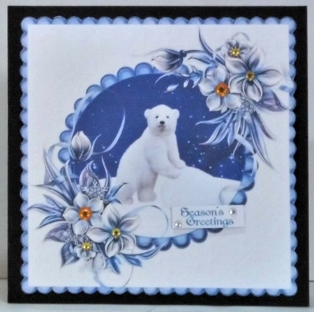 The Polar Bear Cub and Winter Flowers by Hazel Underwood