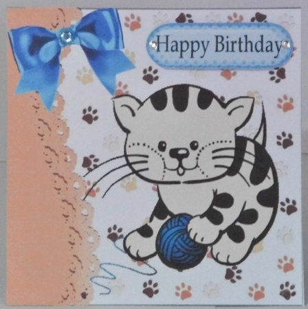 cute kitten playing with ball of wool with blue bow 7x7 by Hazel Underwood