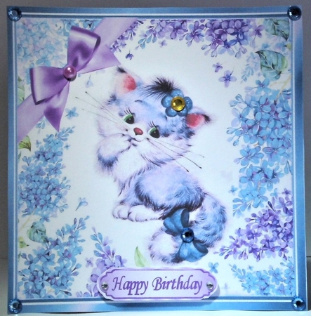 Cute Kitten in frame of flowers with purple bow 8x8 by Hazel Underwood