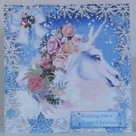 Beauiful white unicorn with roses in the snow 8x8 by Hazel Underwood