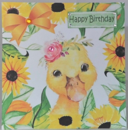 Little yellow duck in frame of yellow sunflowers 8x8 by Hazel Underwood