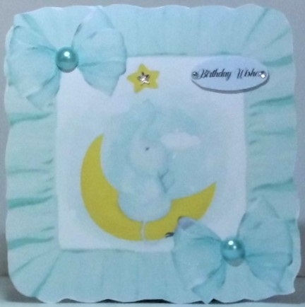 sweet little elephant sitting on a moon in turq frill 8x8 frame by Hazel Underwood