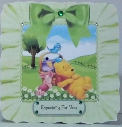 Snoozy bear and friends in frill frame 8x8 with green bow by Hazel Underwood