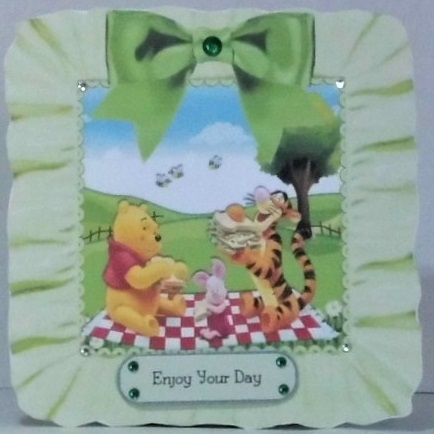 Picnic time with bear and friends in frill frame 8x8 with green bow by Hazel Underwood