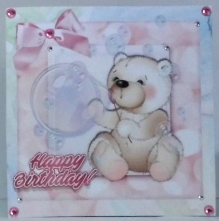 Cute baby bear blowing bubbles in rainbow frame 8x8 by Hazel Underwood