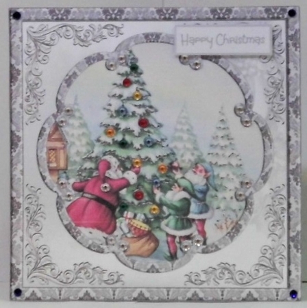 Santa and elves dressing the tree by Hazel Underwood
