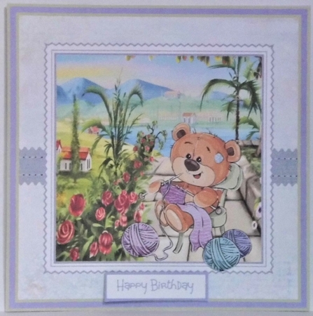 Bear knitting by the sea by Hazel Underwood