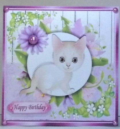 Cute white kitten with pretty lilac flowers, wooden back ground 8x8 by Hazel Underwood