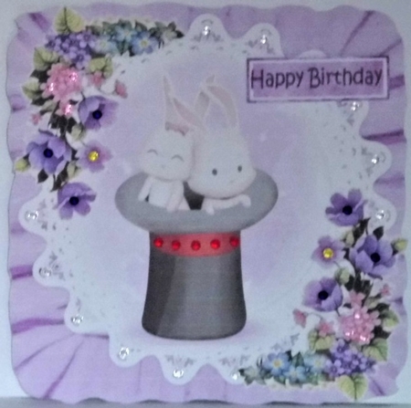 Bunnies in top hat with lace and flowers in purple frill 8x8 frame by Hazel Underwood